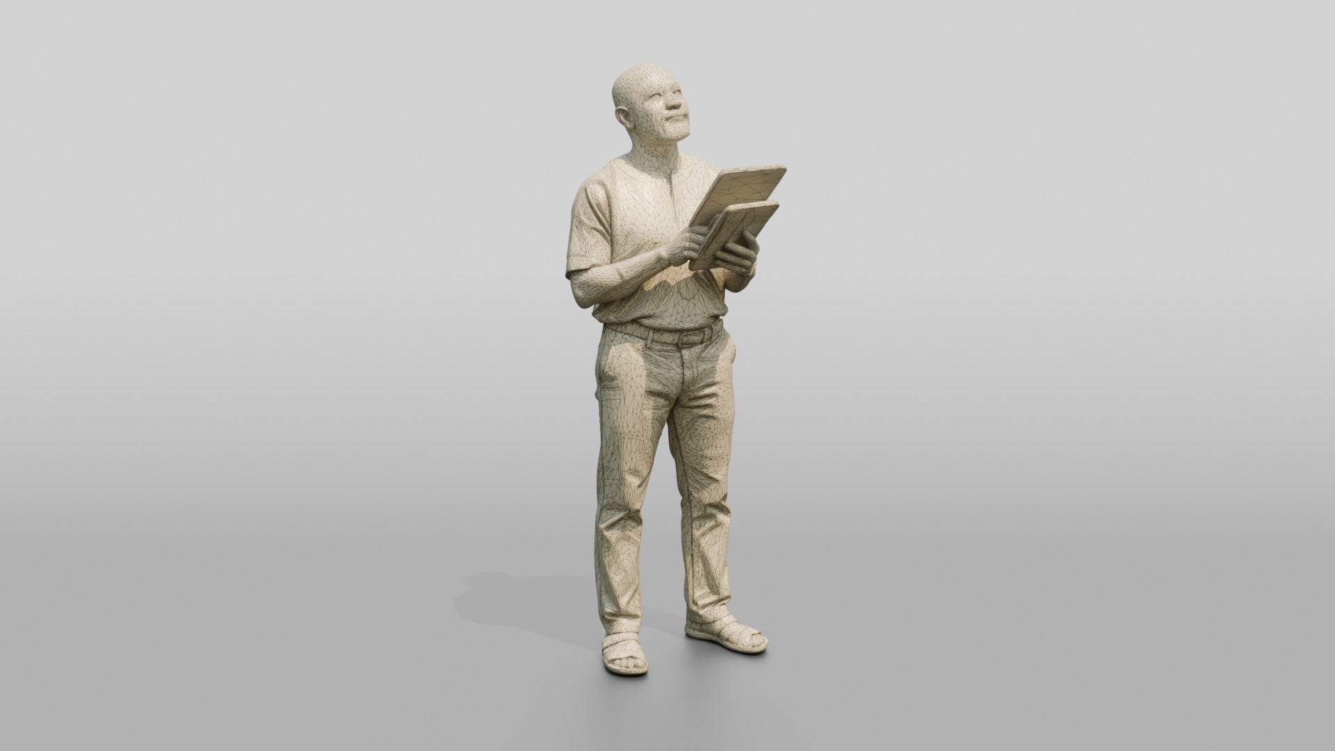 Elderly African Man Holding a Tablet Looking Up