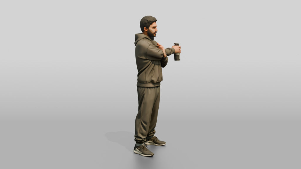Man Stretching Arms with Protein Shaker