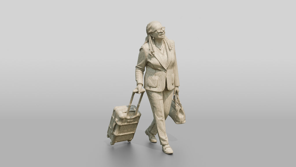 Elderly Black Woman in Green Blazer with Patterned Luggage