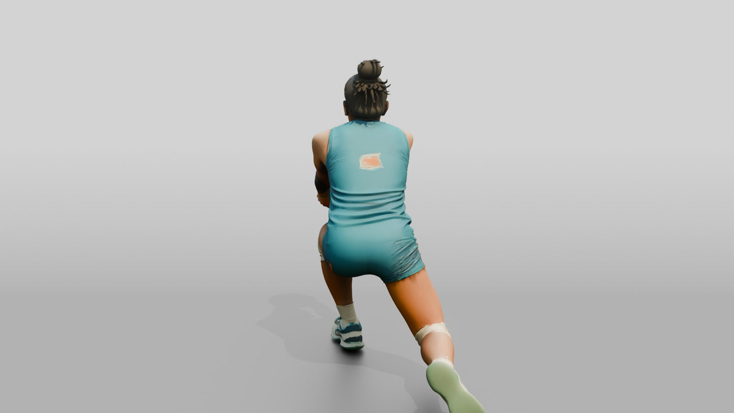 South Asian Female Volleyball Player in Teal Uniform
