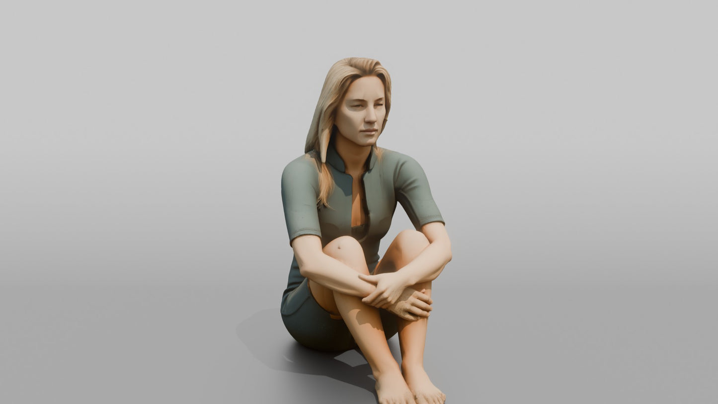 Surfer Sitting and Hugging Her Knees