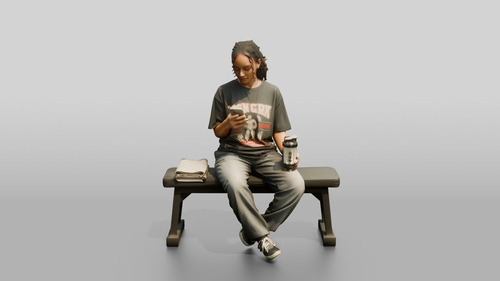 Woman Sitting with Protein Shaker