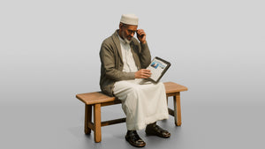 Elderly African Man Reading a Tablet on a Bench - 3D character model, view 1