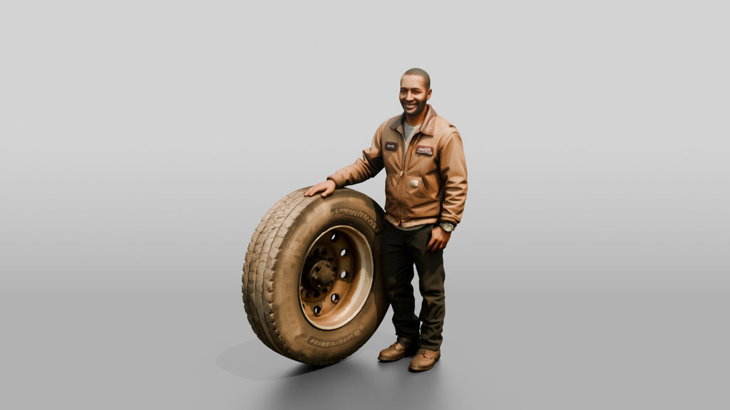 Mechanic Resting Hand on a Truck Tire