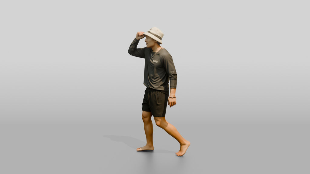 Man Adjusting Bucket Hat Brim