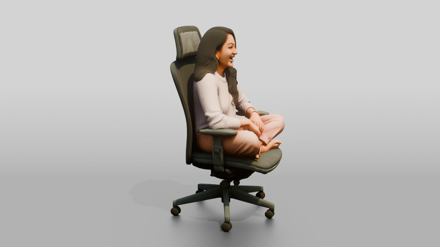 Woman Sitting Cross-Legged in an Office Chair
