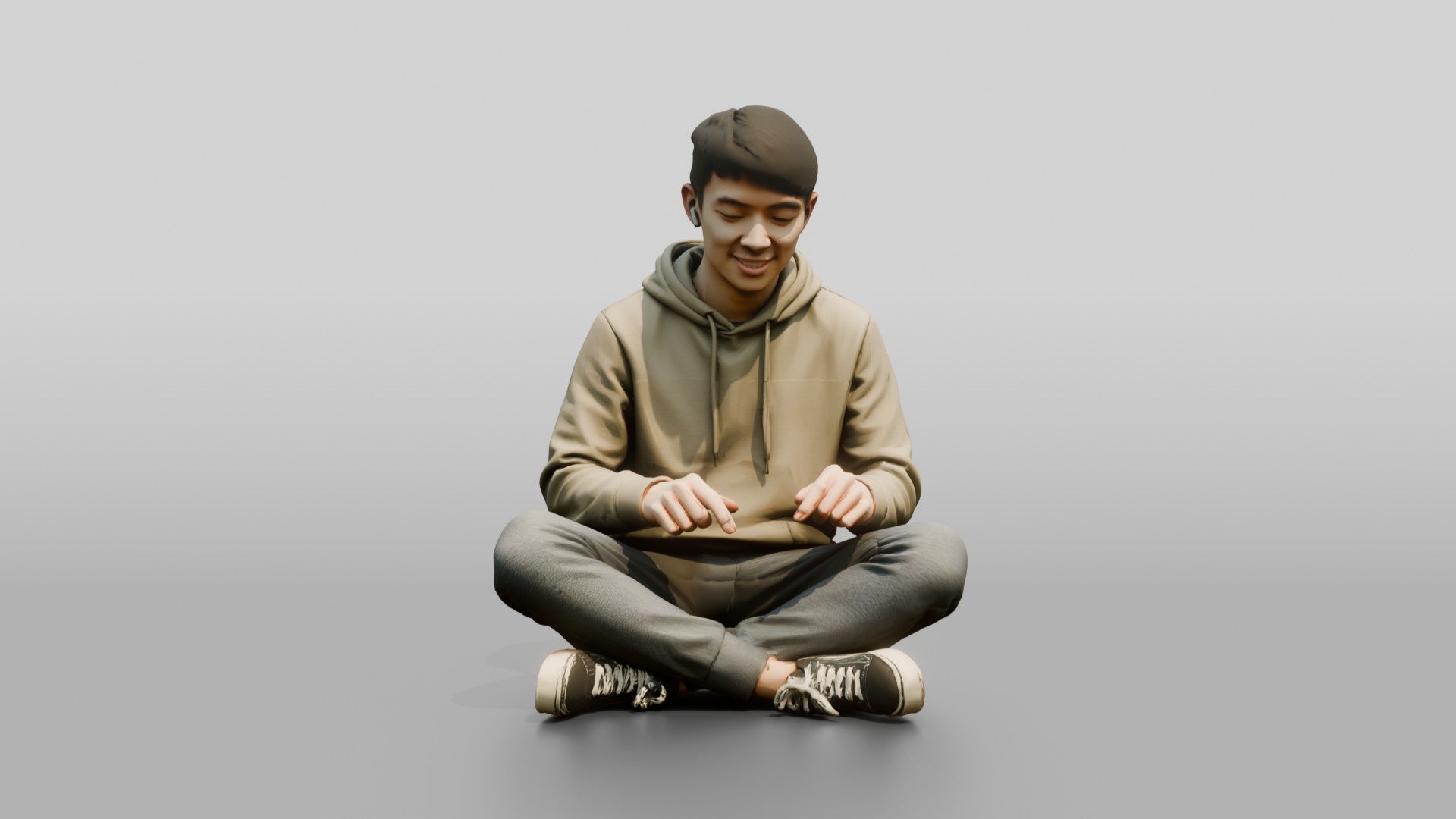 Young Chinese Man Sitting Cross-Legged Relaxing
