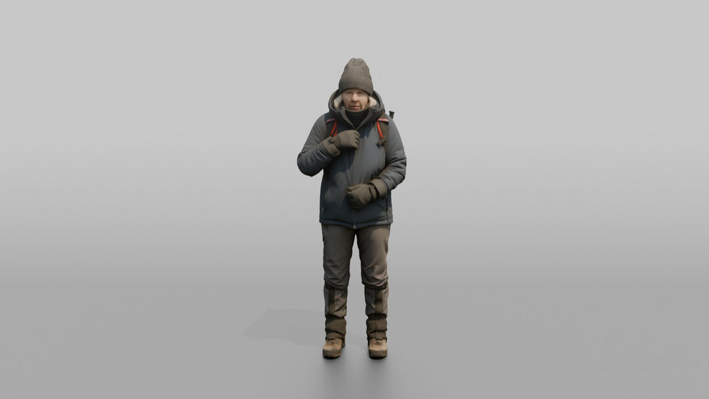 Winter Hiker Zipping Up Her Jacket