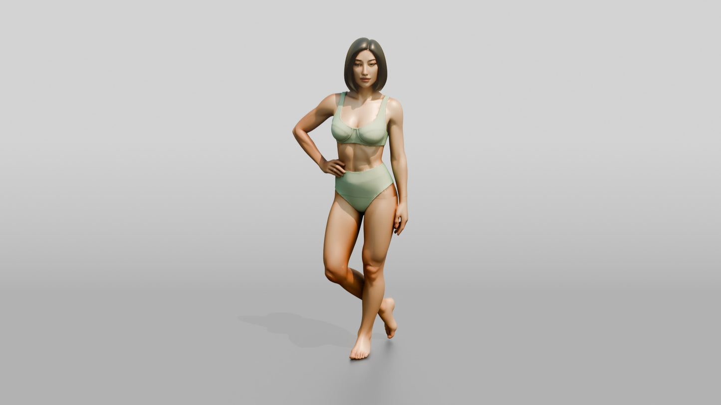Woman in Mint Two-Piece Swimsuit with Hand on Hip