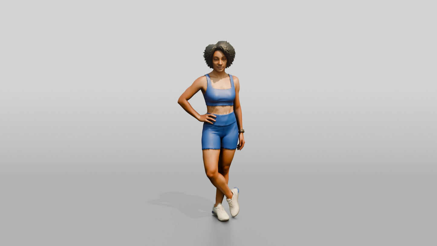 Black Woman in Blue Activewear with Hands on Hips