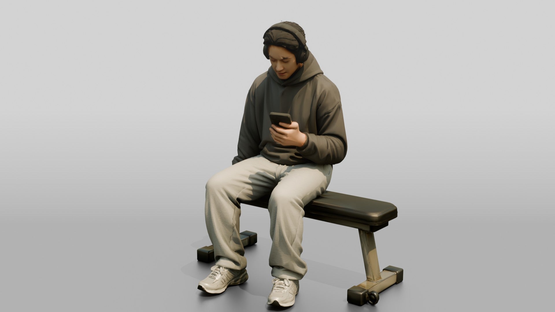 Man Sitting Checking Smartphone