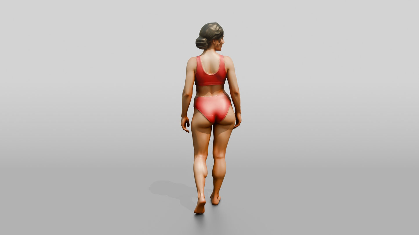 Woman in Red Two-Piece Swimsuit Walking