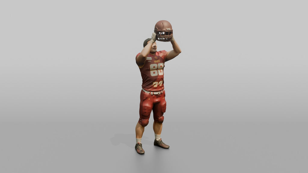 Player Raising His Helmet Triumphantly