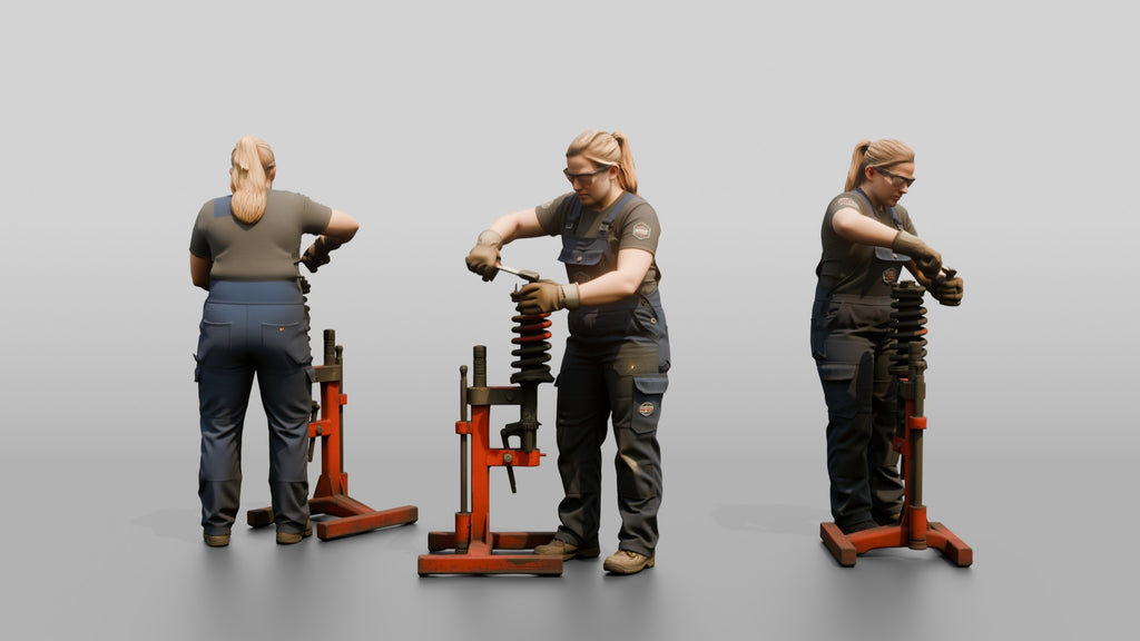 Mechanic Replacing a Shock Absorber