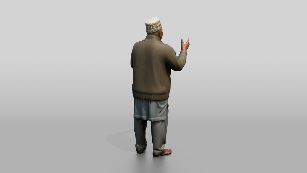Elderly African Man in a Fula Hat Gesturing While Talking