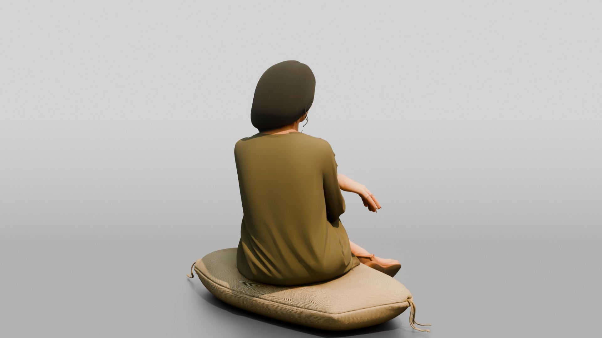 Woman Sitting Cross-Legged in Olive