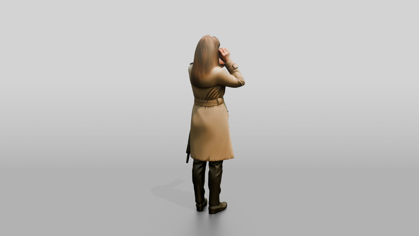 White Woman in Trench Coat Fixing Her Hair