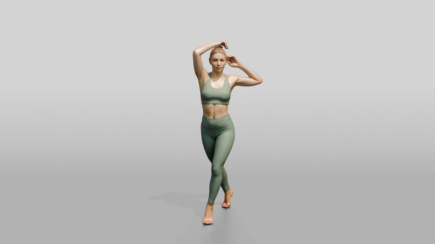 Blonde Woman Tying Her Ponytail in Sage Activewear