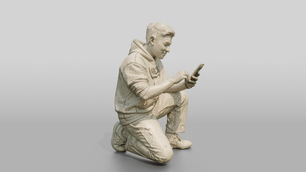 Asian Man Crouched Texting on Phone