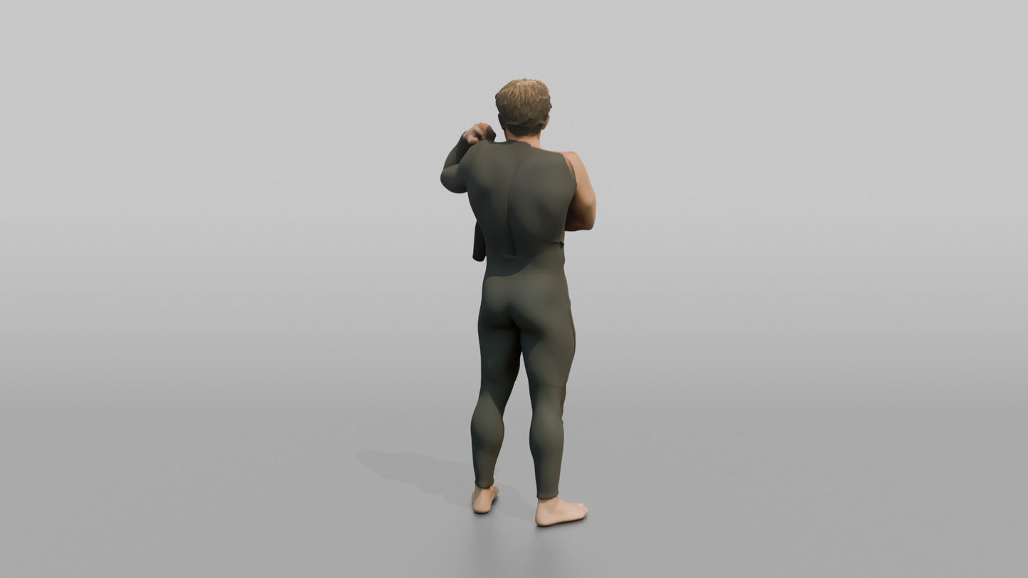 Surfer Adjusting His Wetsuit Sleeve