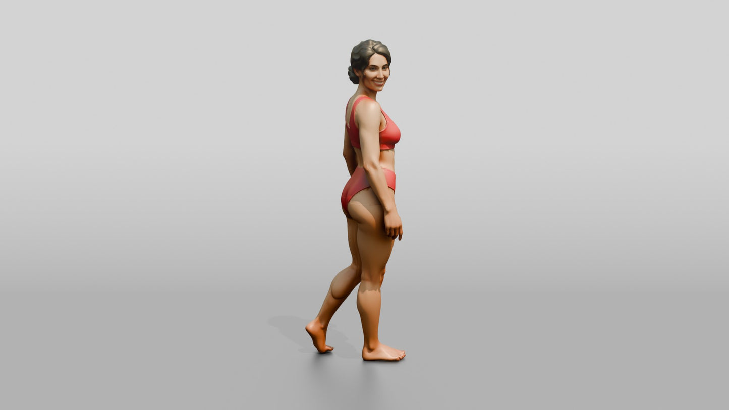 Woman in Red Two-Piece Swimsuit Walking