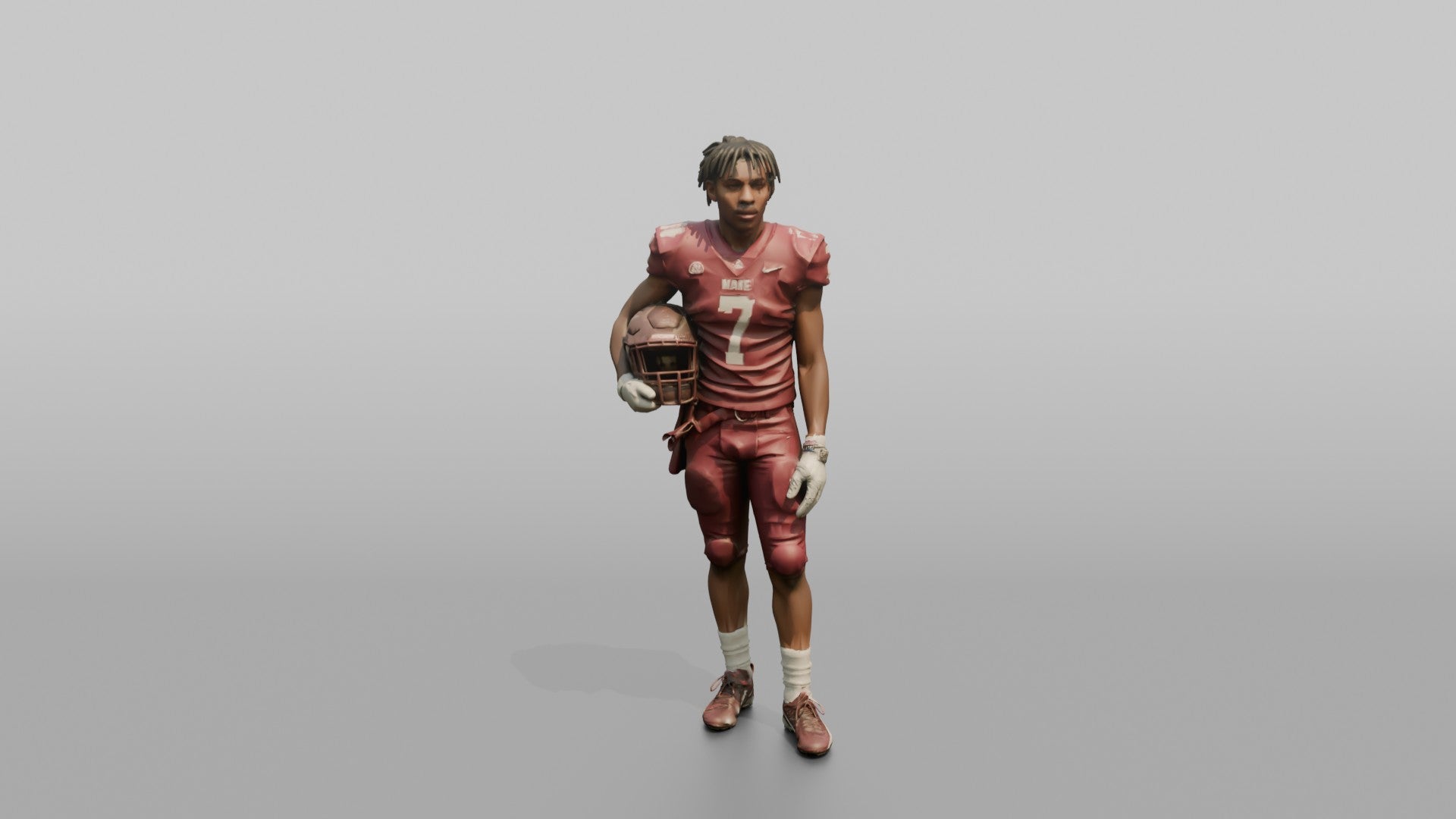 Quarterback Standing with Helmet Under His Arm