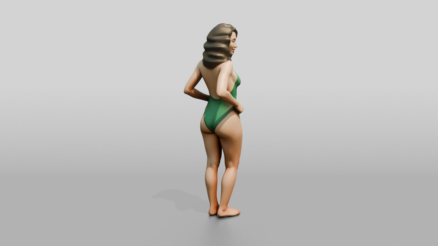 Woman in Green One-Piece Swimsuit with Hand on Hip