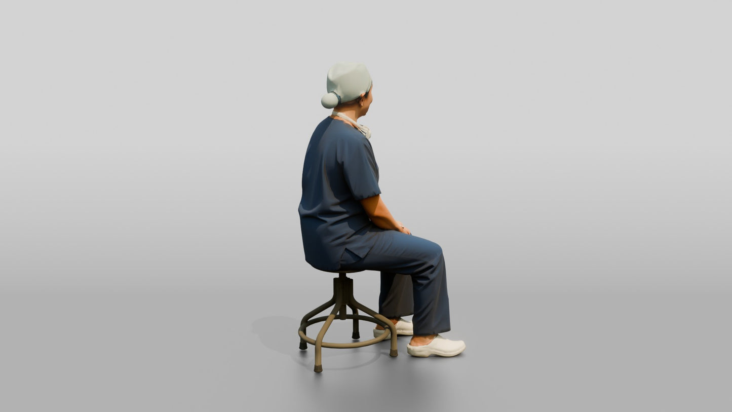 Middle-Aged South Asian Woman Doctor Sitting on Stool