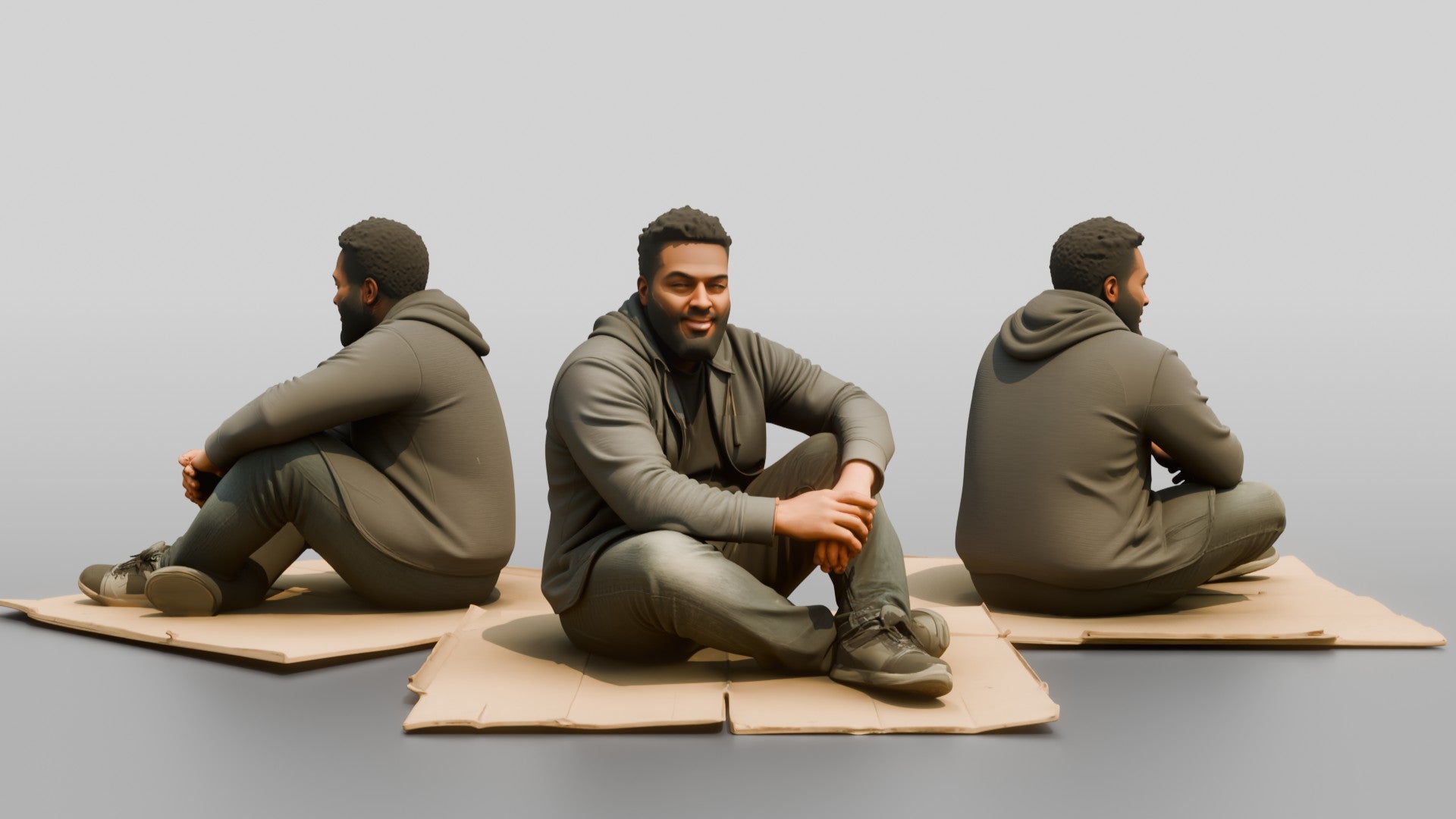 Homeless Man Sitting Flat on a Piece of Cardboard
