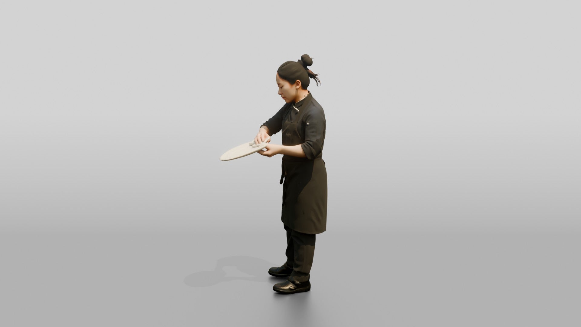 Chef Wiping a Plate Rim