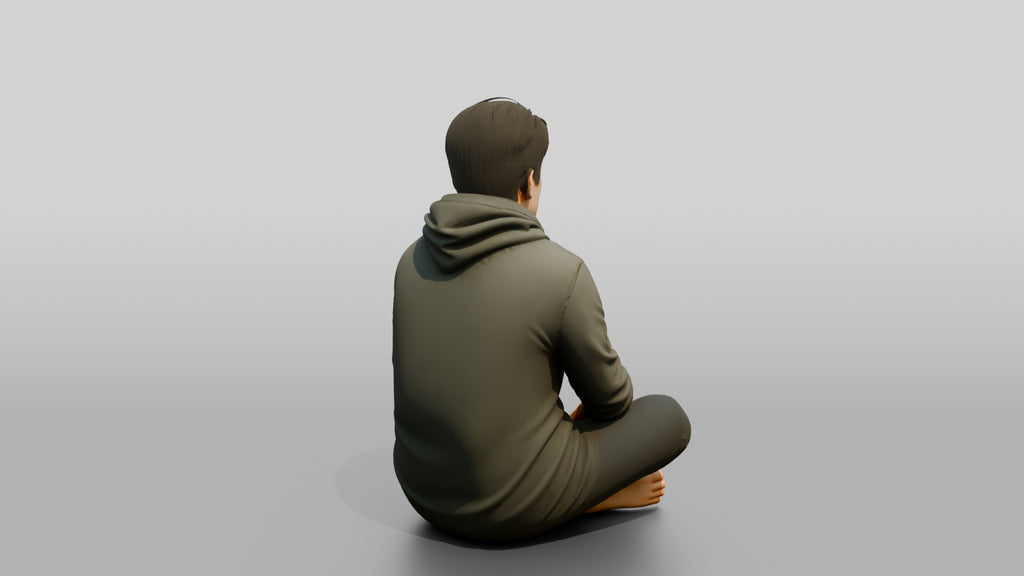 Homeless Man Looking Unfocused While Seated on the Floor