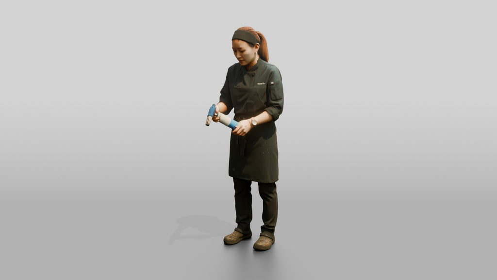 Line Cook Searing Tuna with a Blowtorch