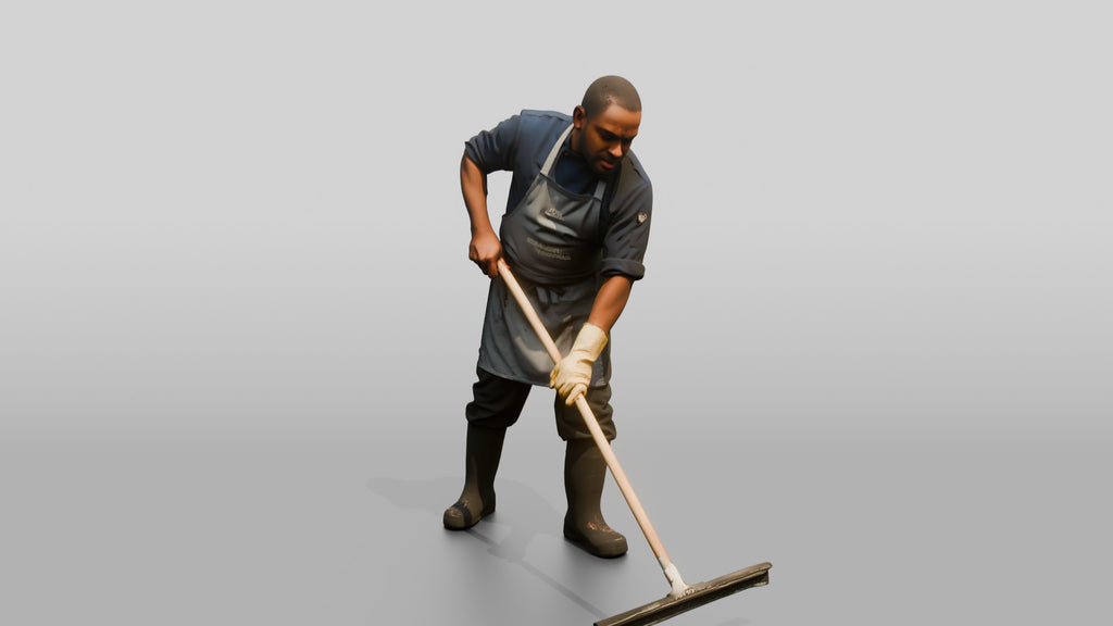 Kitchen Porter Squeegeeing the Floor
