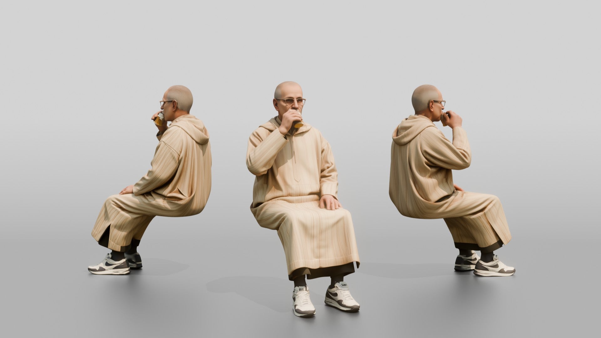 Elderly African Man in a Djellaba Sitting and Drinking Tea