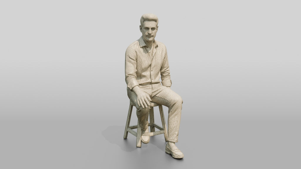 Man Relaxing on a Stool in Linen