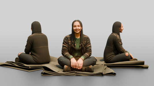 Homeless Woman Sitting on a Folded Tarp