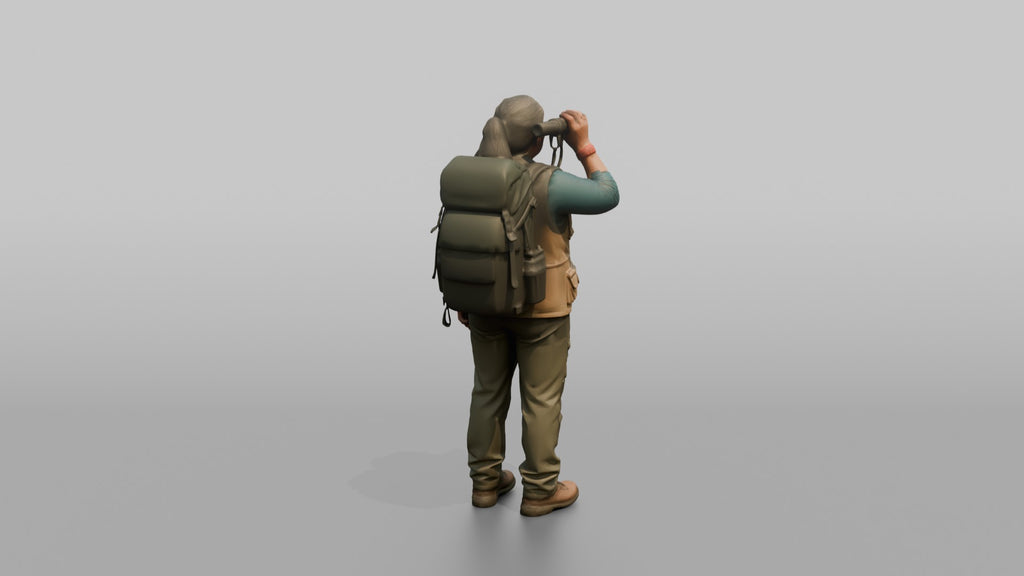 Hiker Holding Up a Pair of Binoculars