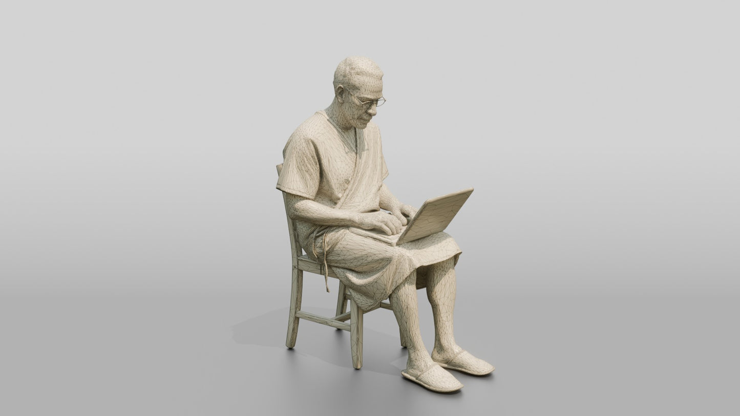 Elderly Man Patient Using a Laptop