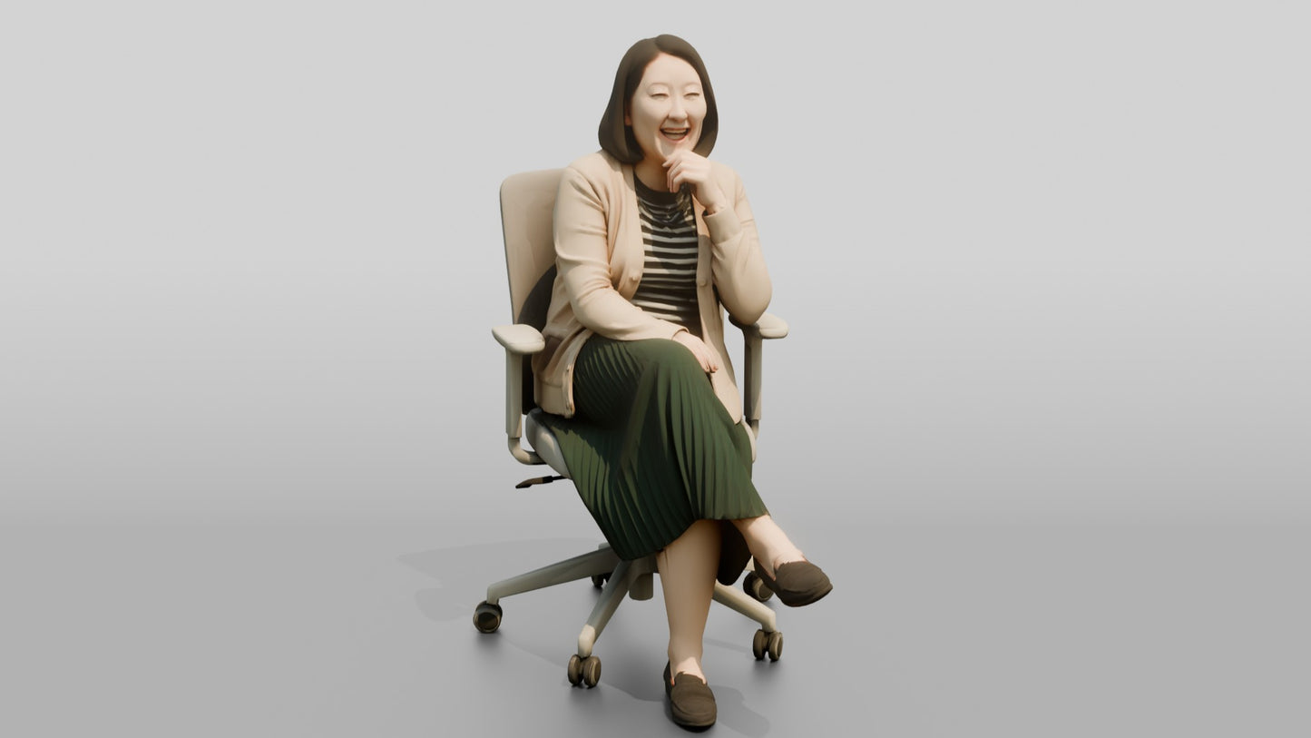 Woman Laughing in an Office Chair