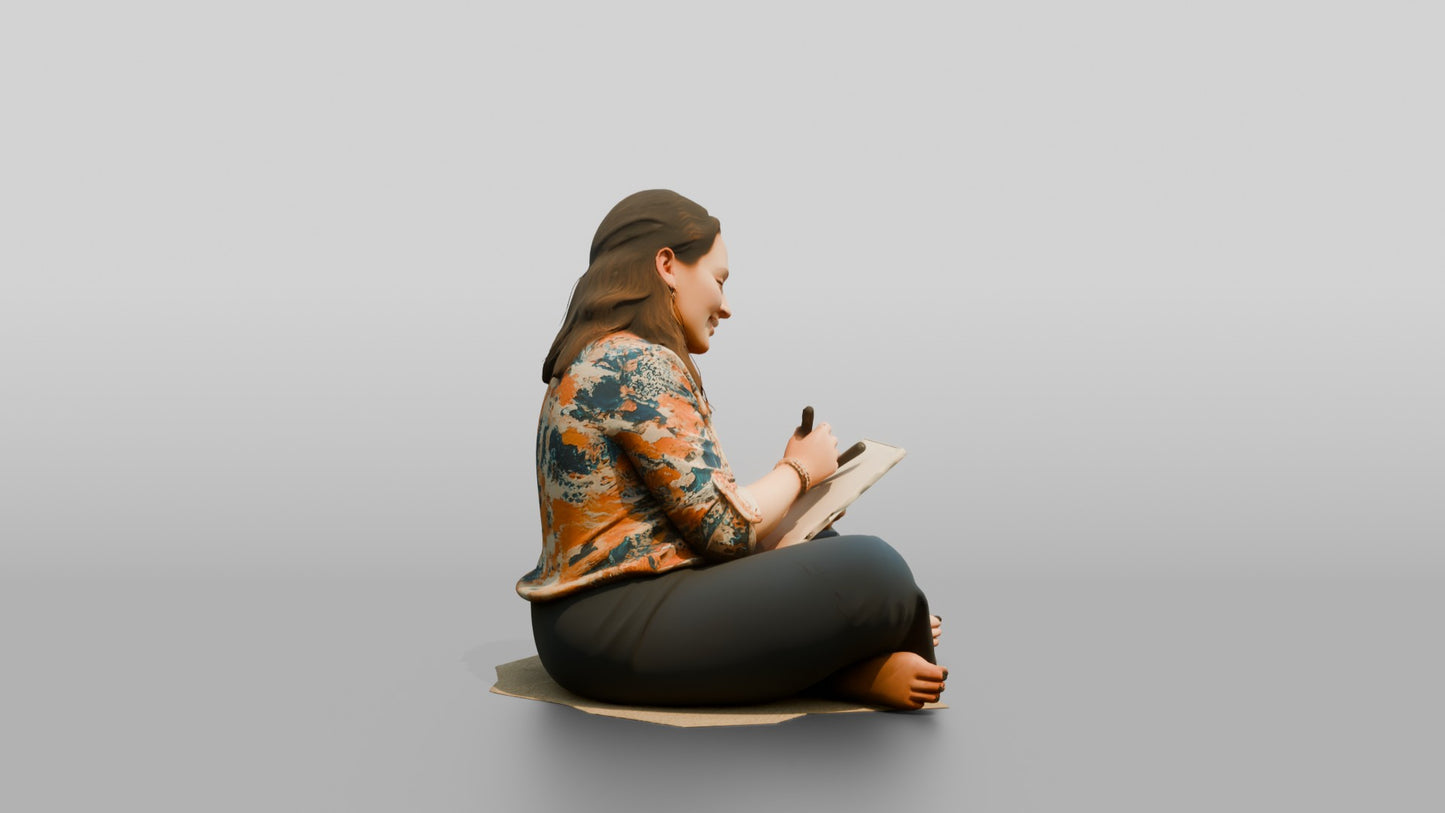 Woman Seated on the Floor with a Tablet