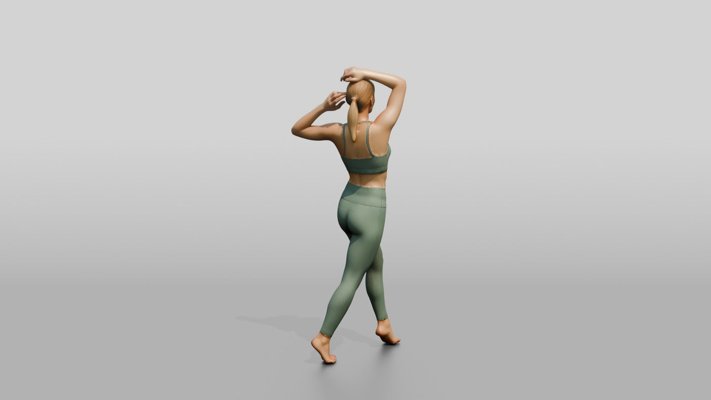 Blonde Woman Tying Her Ponytail in Sage Activewear
