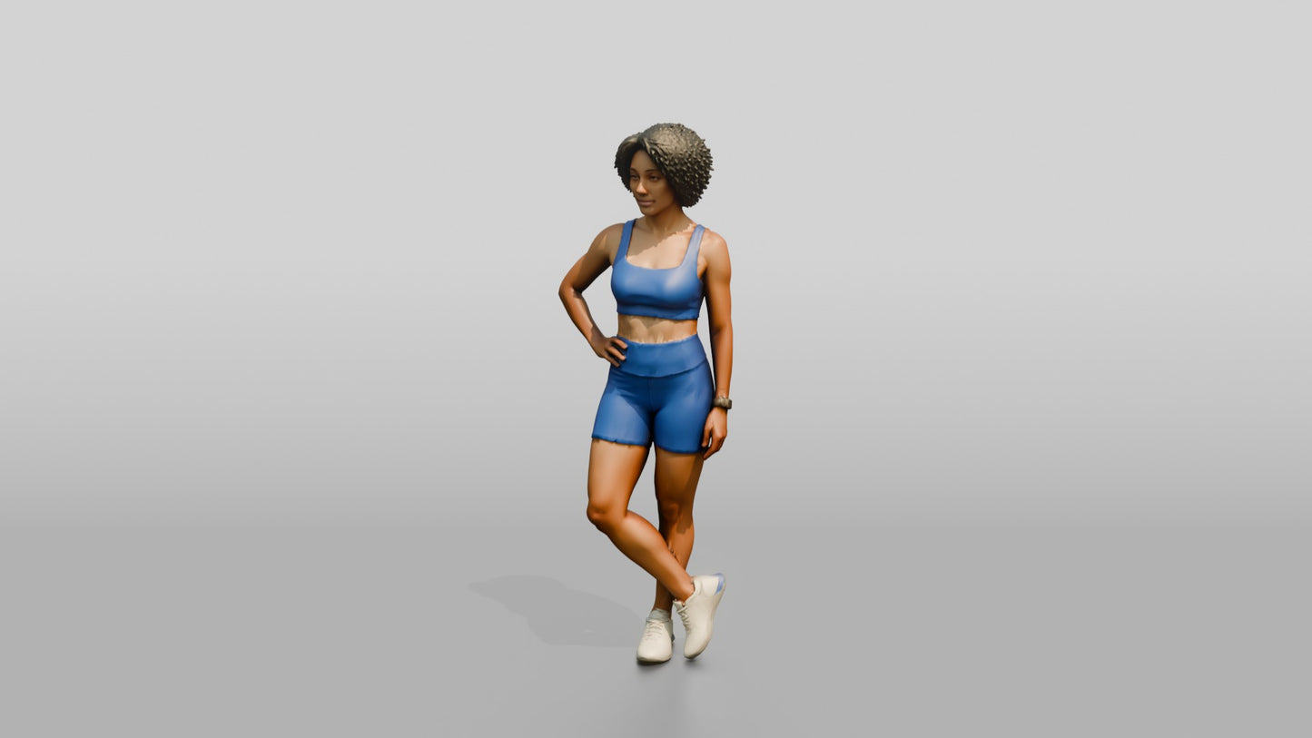 Black Woman in Blue Activewear with Hands on Hips
