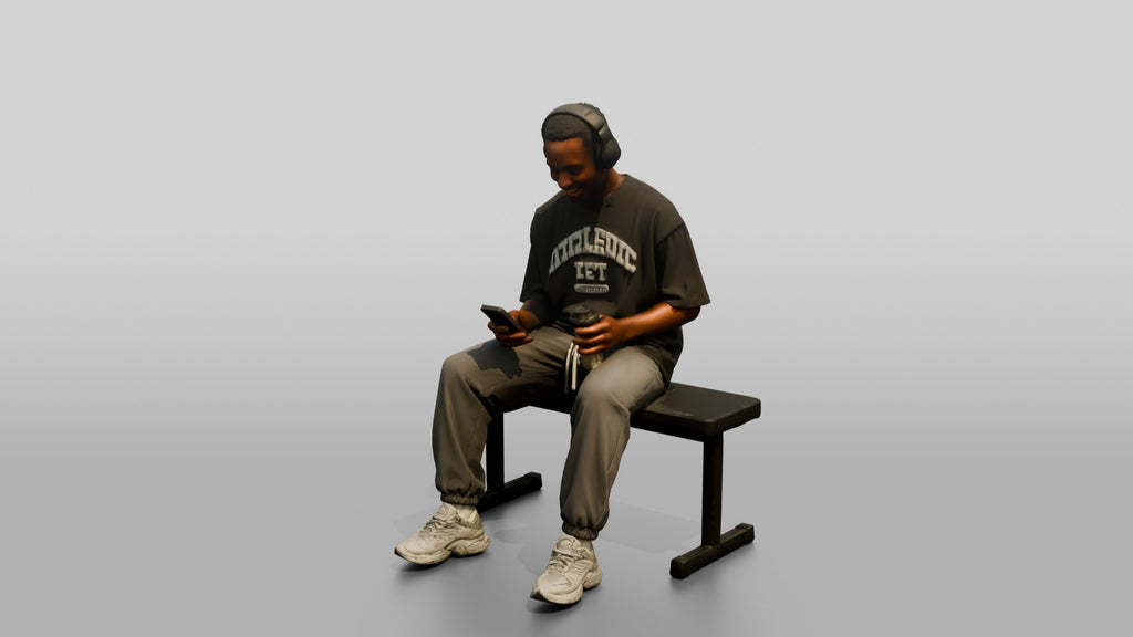 Man Sitting with Shaker and Headphones