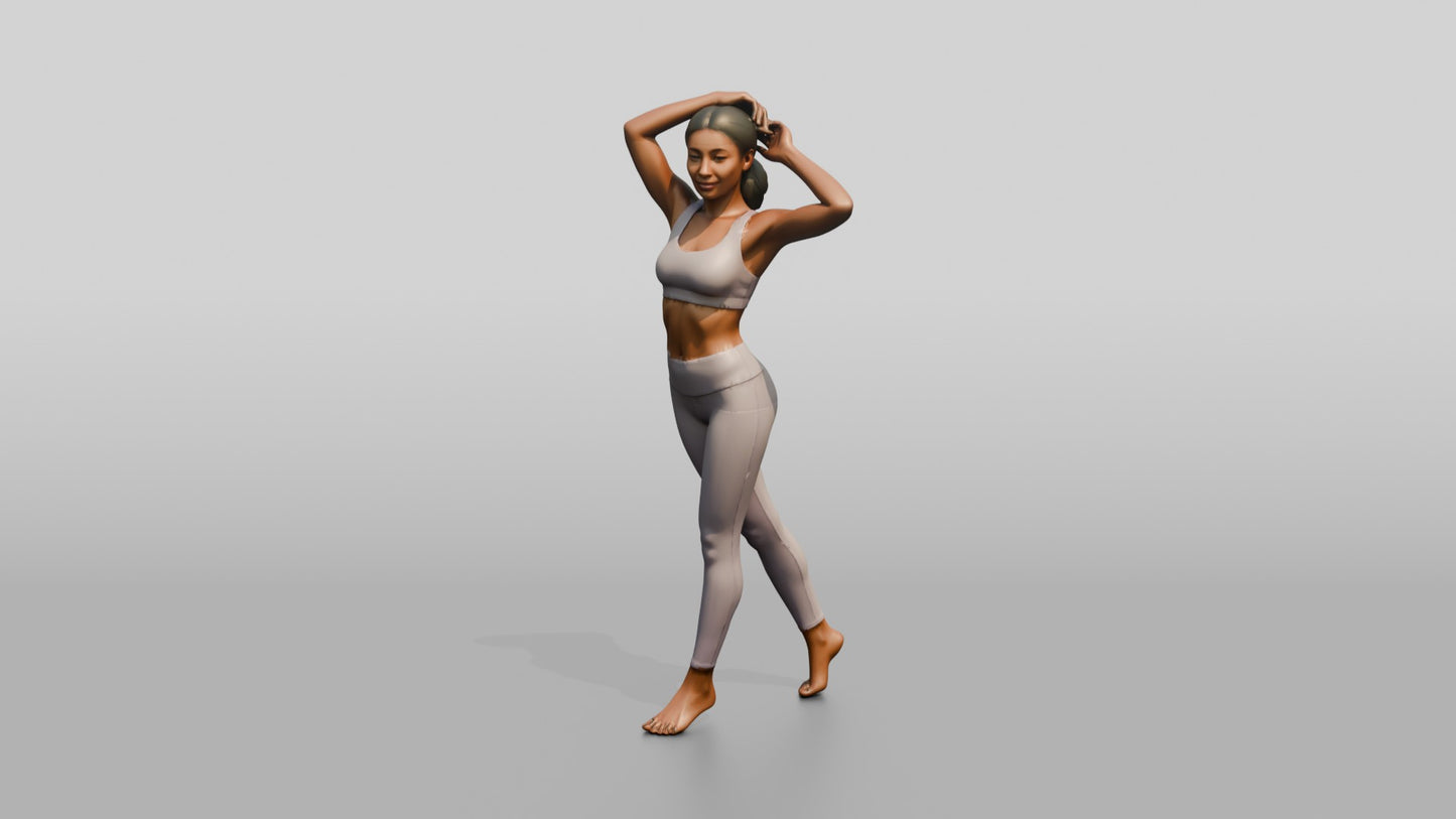 Woman in Lilac Activewear with Arms Raised to Her Hair