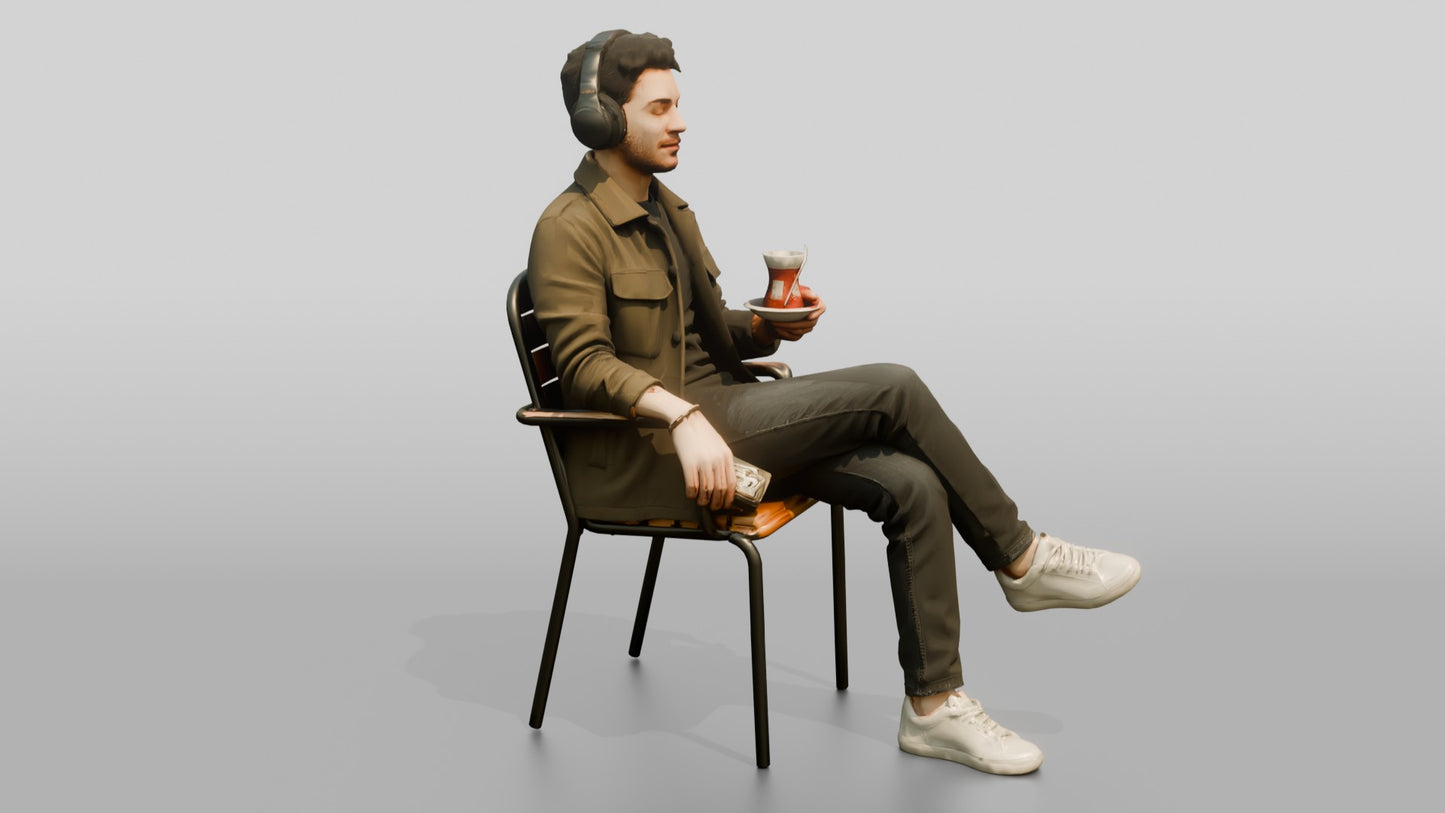 Man Listening to Music with Tea