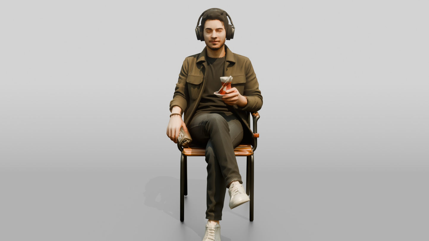 Man Listening to Music with Tea