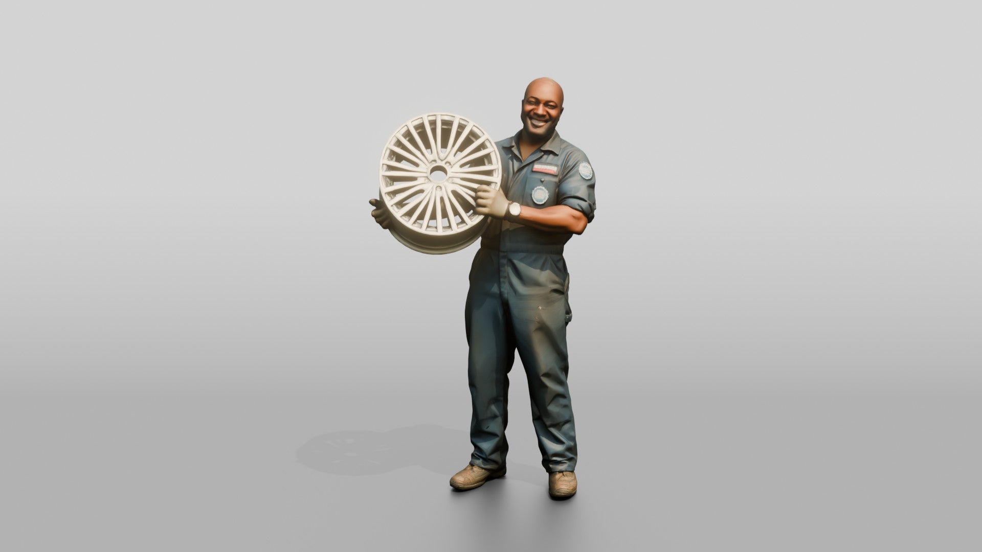 Mechanic Lifting an Alloy Wheel