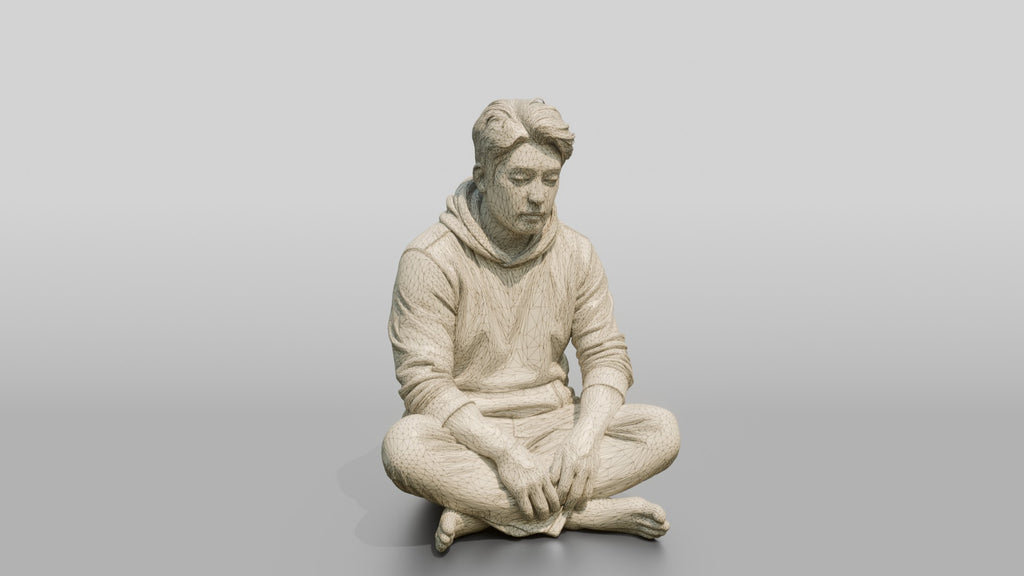 Homeless Man Looking Unfocused While Seated on the Floor