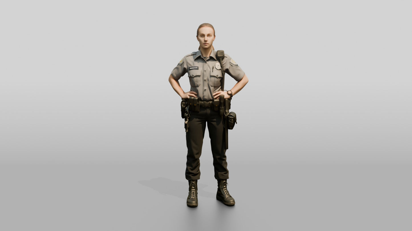 Caucasian Female Guard in a Grey Patrol Shirt and Dark Trousers