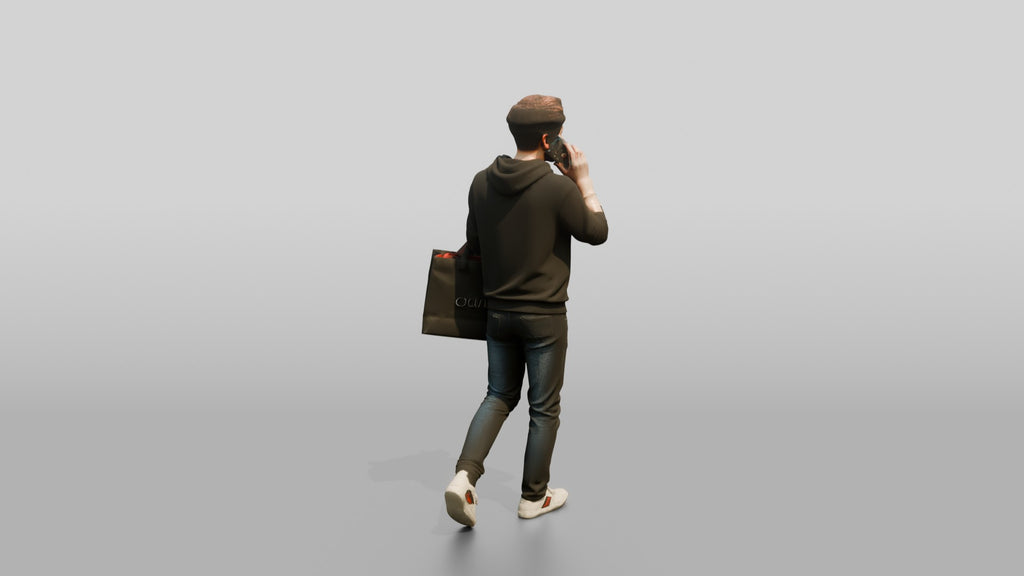 Young Chinese Man Shopping and Talking on Phone